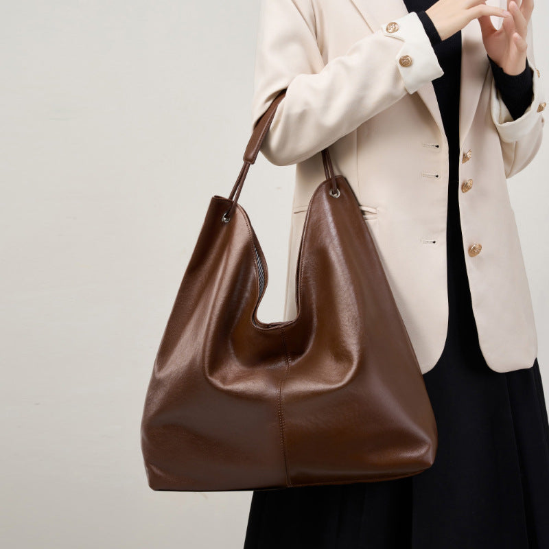 2024 New Vegetable Tanned Cowhide Popular Large Capacity Texturous Tote Bag All-match Shoulder Class Underarm Commuter Bag